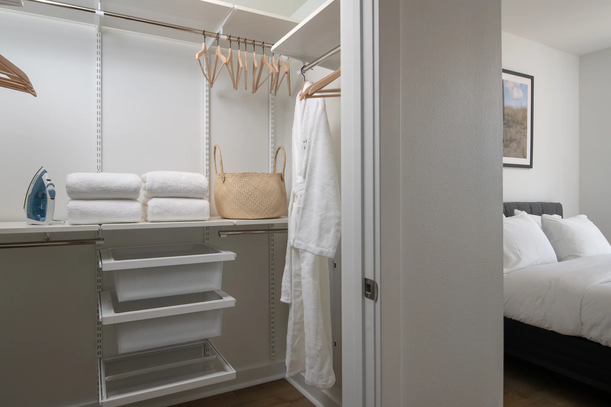 Custom closet in the Signature One Bedroom at Ariva Serviced Residences