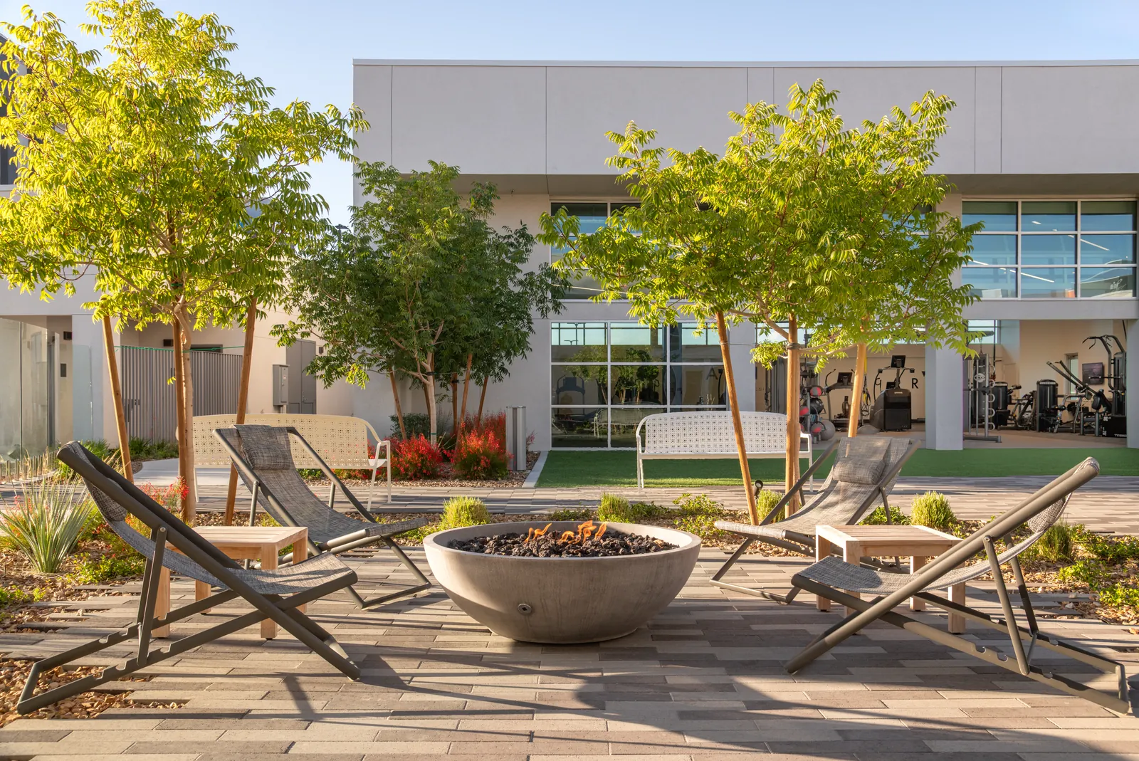 Landscaped courtyard and outdoor seating at Ariva